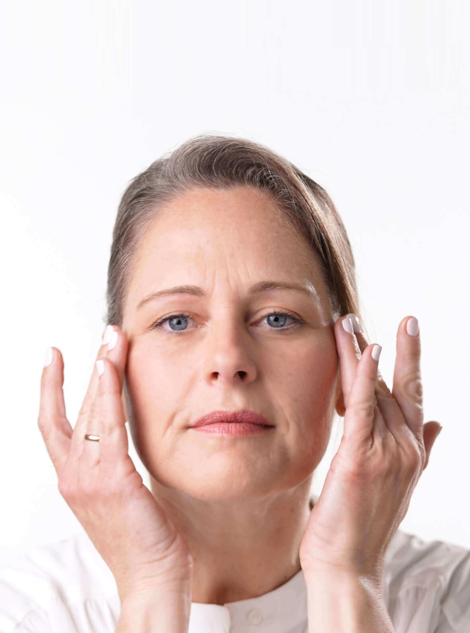Woman Applying FormulAging Anti-Aging Eye Cream